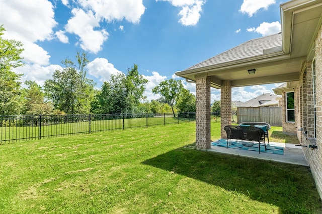 view of yard with a patio area