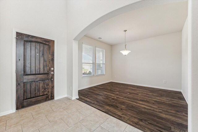 entryway featuring light tile patterned flooring