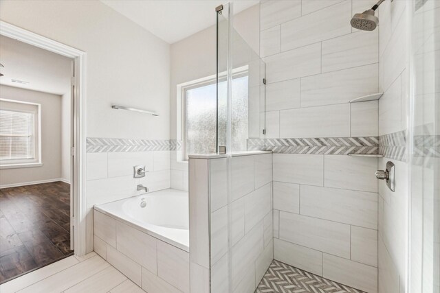 bathroom with plus walk in shower