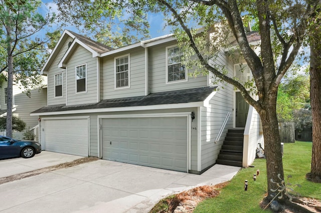 view of front of property featuring a garage