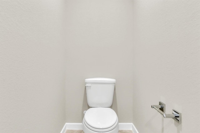 bathroom featuring toilet