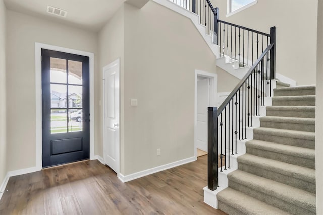 entrance foyer featuring hardwood / wood-style floors