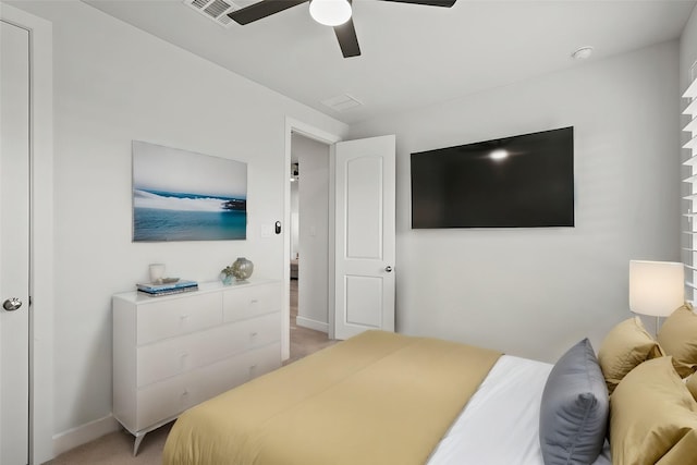 bedroom featuring ceiling fan and light colored carpet