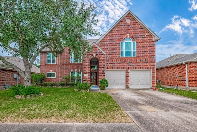 view of front of home featuring a front lawn and a garage