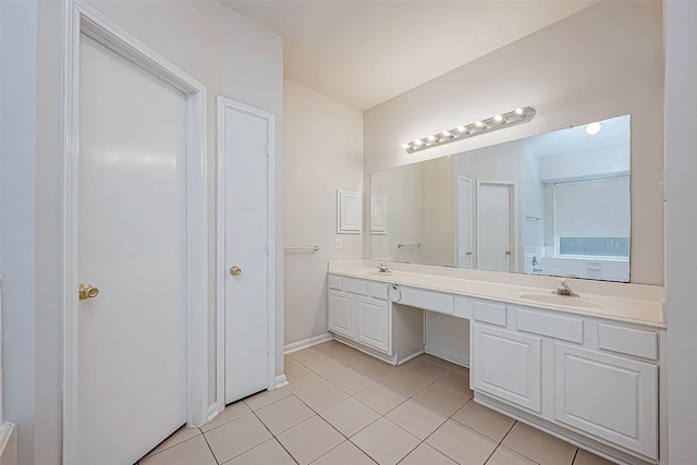 bathroom with vanity and tile patterned floors