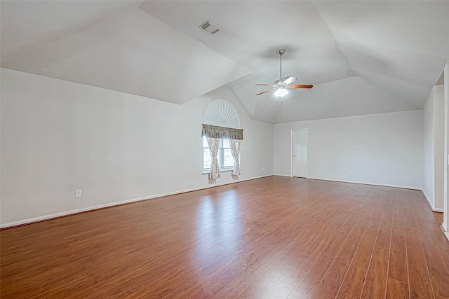 interior space featuring hardwood / wood-style flooring, ceiling fan, and lofted ceiling