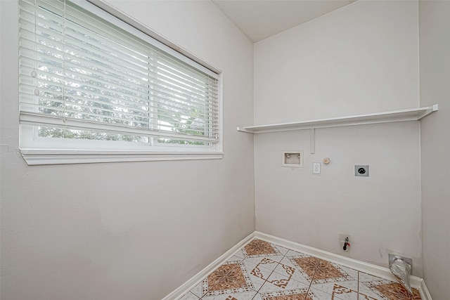 laundry area featuring hookup for an electric dryer, gas dryer hookup, and a healthy amount of sunlight