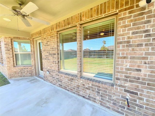 view of patio / terrace featuring ceiling fan