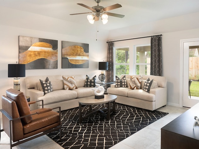 living room with tile patterned floors and ceiling fan