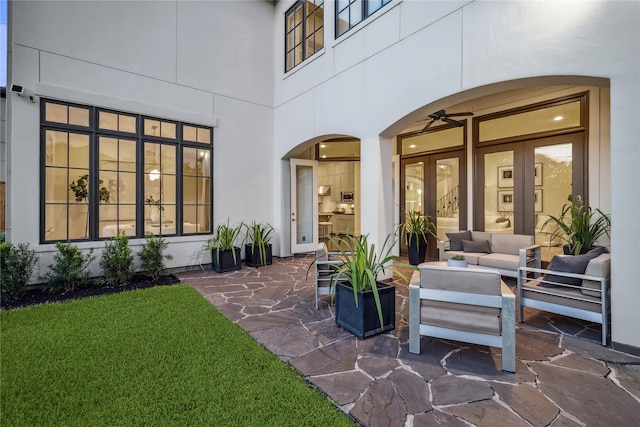 view of patio / terrace with french doors, ceiling fan, and outdoor lounge area