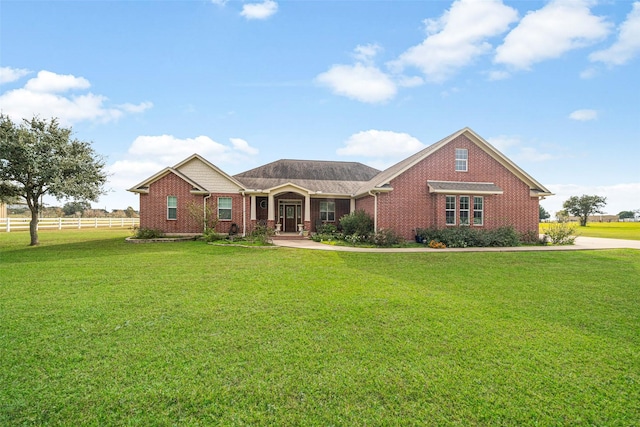 view of front of home with a front yard