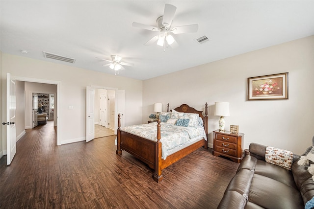 bedroom featuring dark hardwood / wood-style flooring and ceiling fan