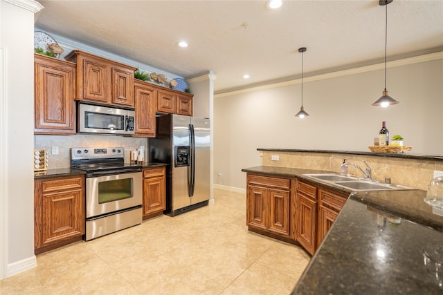 kitchen with crown molding, sink, appliances with stainless steel finishes, tasteful backsplash, and decorative light fixtures