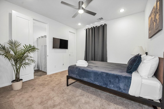 bedroom with ceiling fan and carpet