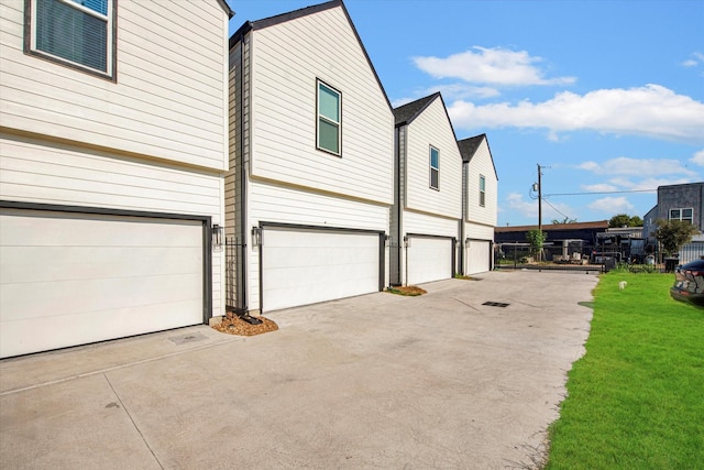 view of side of home with a garage