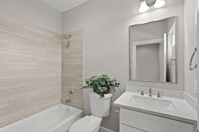 full bathroom with toilet, vanity, and tiled shower / bath combo