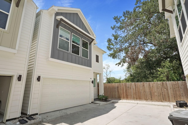 view of home's exterior with a garage