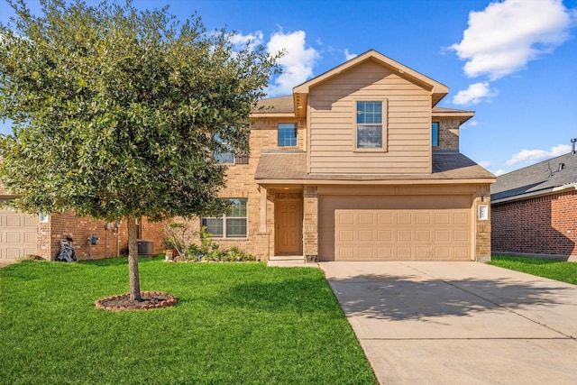 front facade featuring a garage, a front yard, and central AC