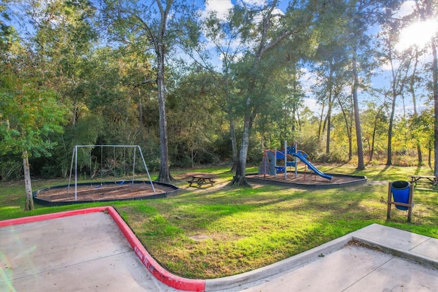 view of playground with a yard