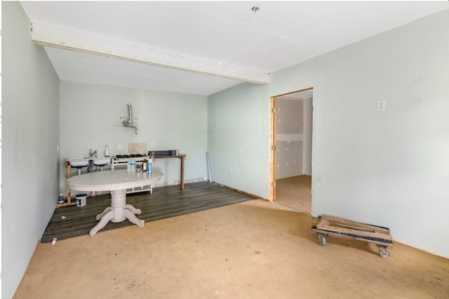 interior space featuring beam ceiling