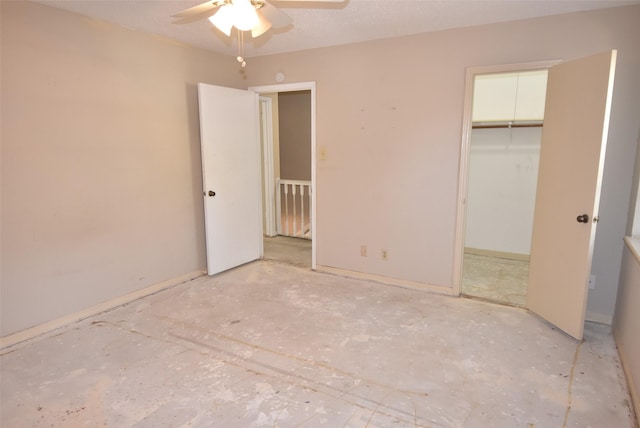 unfurnished bedroom featuring a textured ceiling, a closet, and ceiling fan