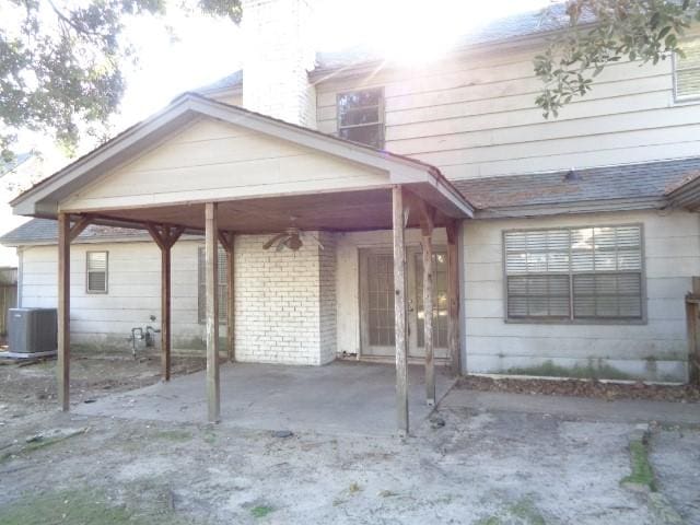 view of front of home featuring cooling unit