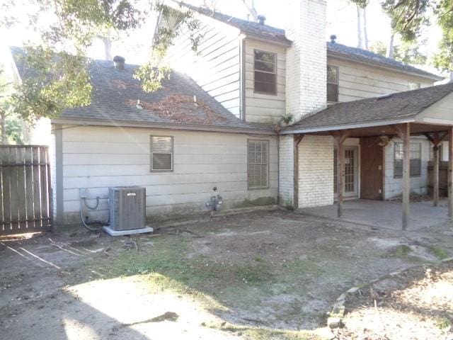 back of house with a patio and central AC unit