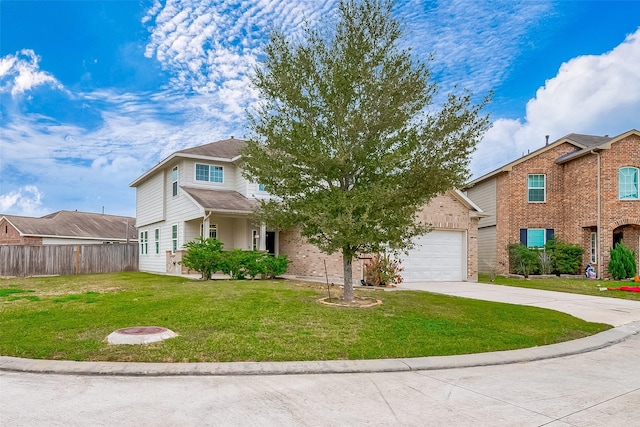 view of front of home featuring a garage and a front lawn