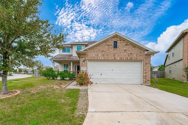 view of front of house with covered porch, a garage, and a front lawn