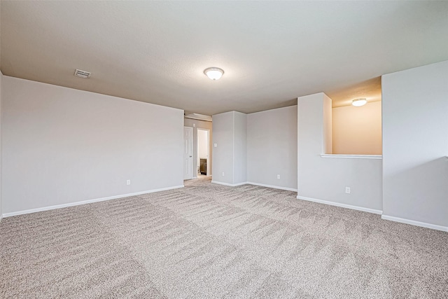 spare room with carpet flooring