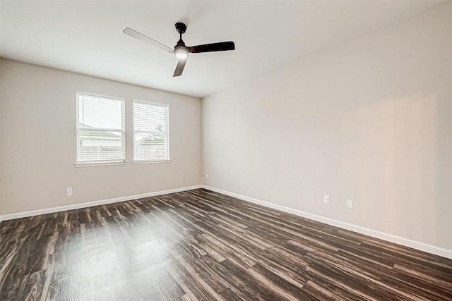 unfurnished room with ceiling fan and dark wood-type flooring