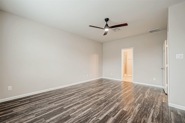 unfurnished room featuring dark hardwood / wood-style flooring and ceiling fan