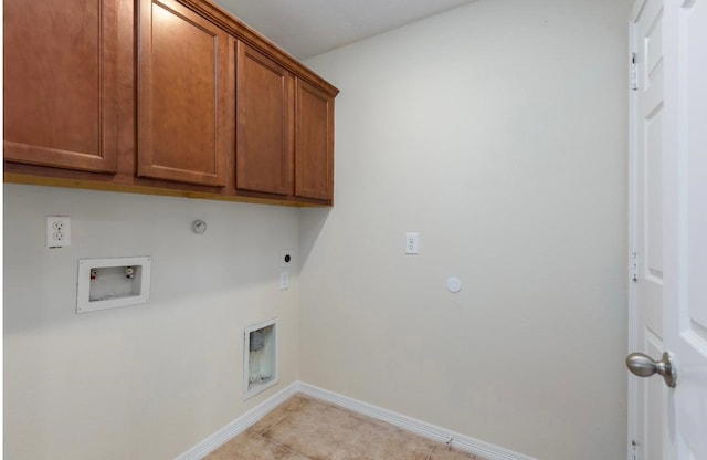 laundry area with cabinets, hookup for a washing machine, gas dryer hookup, electric dryer hookup, and light tile patterned flooring