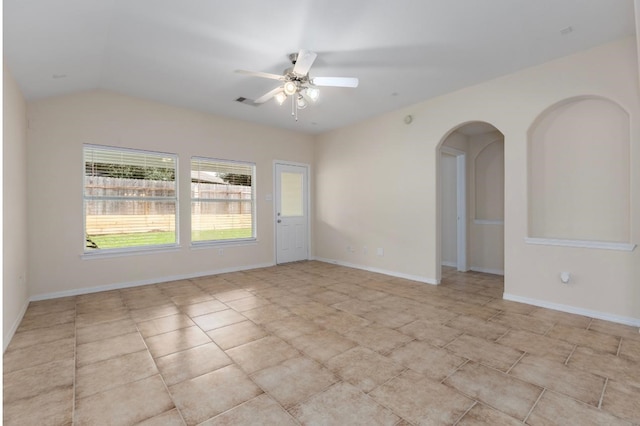 unfurnished room with ceiling fan and lofted ceiling