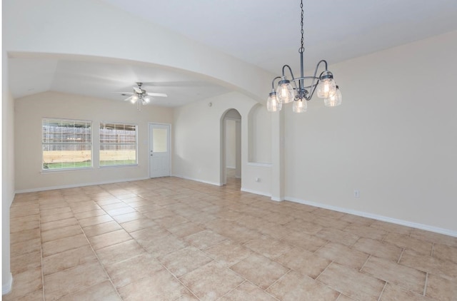 unfurnished room with ceiling fan with notable chandelier, light tile patterned flooring, and vaulted ceiling