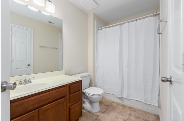 full bathroom featuring tile patterned flooring, vanity, shower / bath combination with curtain, and toilet