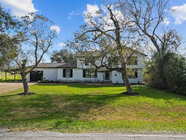 view of front of house with a front lawn