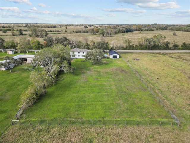 birds eye view of property featuring a rural view