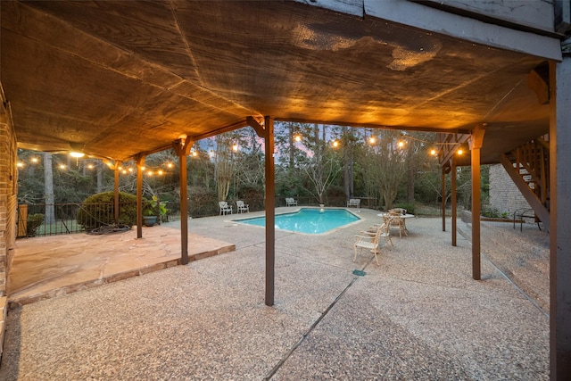 view of swimming pool featuring a patio