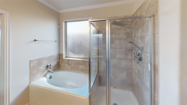 bathroom with crown molding and shower with separate bathtub