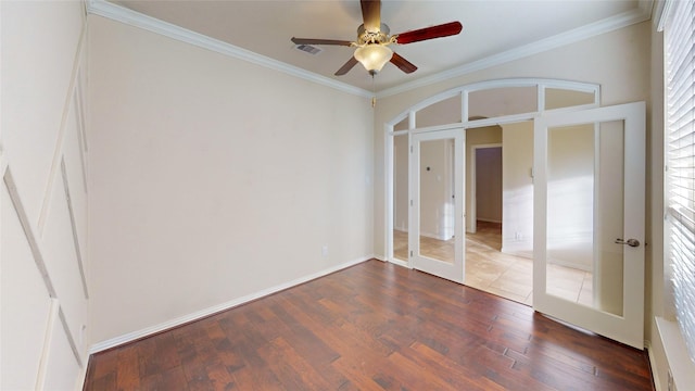 unfurnished bedroom with french doors, dark hardwood / wood-style flooring, ceiling fan, and ornamental molding