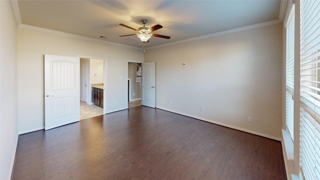 unfurnished bedroom featuring wood-type flooring, ensuite bath, ceiling fan, and crown molding