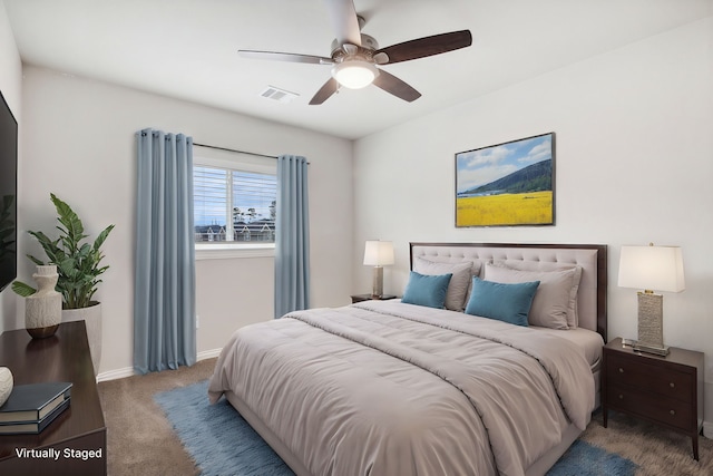 bedroom featuring ceiling fan and carpet floors