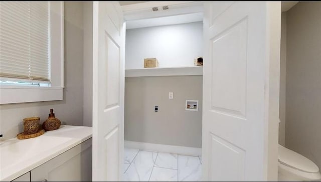 laundry area with hookup for a washing machine and electric dryer hookup