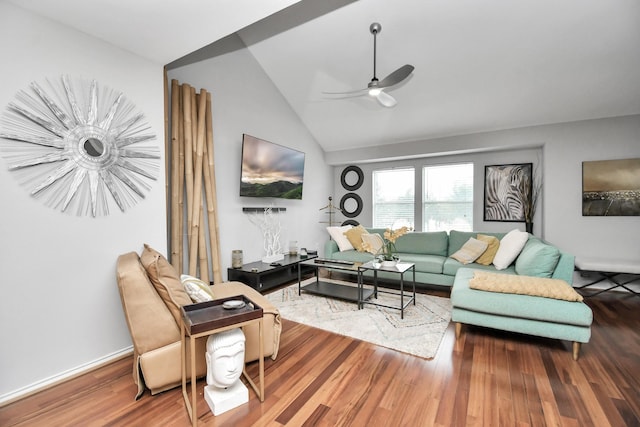 living room featuring ceiling fan, wood-type flooring, and lofted ceiling