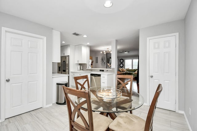 dining area featuring sink