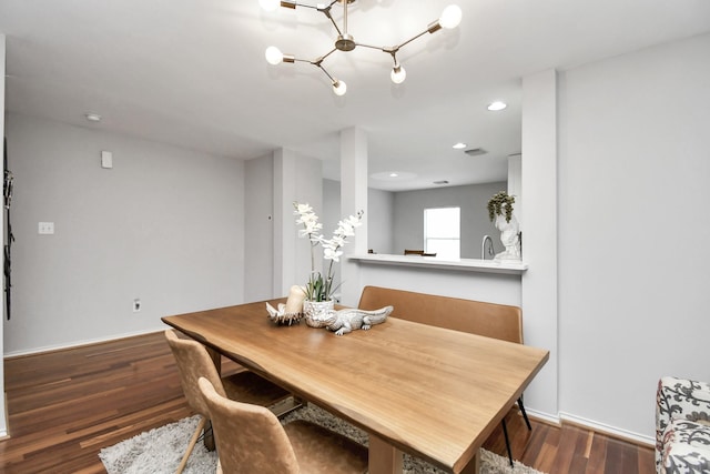 dining area featuring dark hardwood / wood-style floors