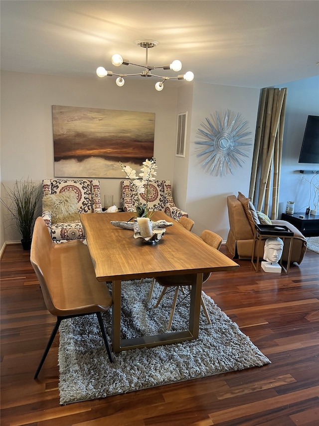 dining space featuring dark hardwood / wood-style floors