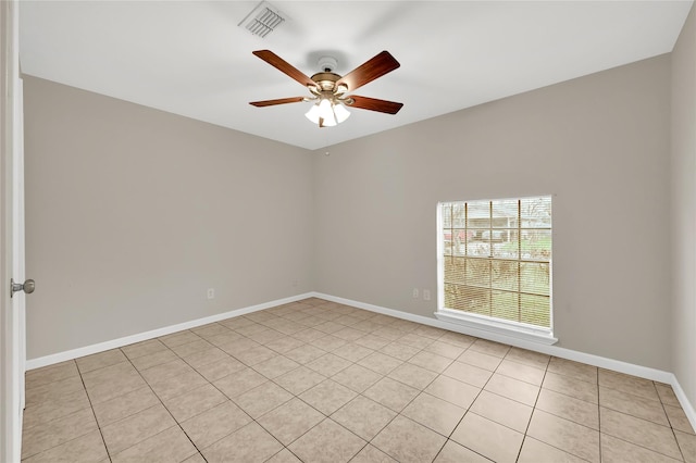 unfurnished room with ceiling fan