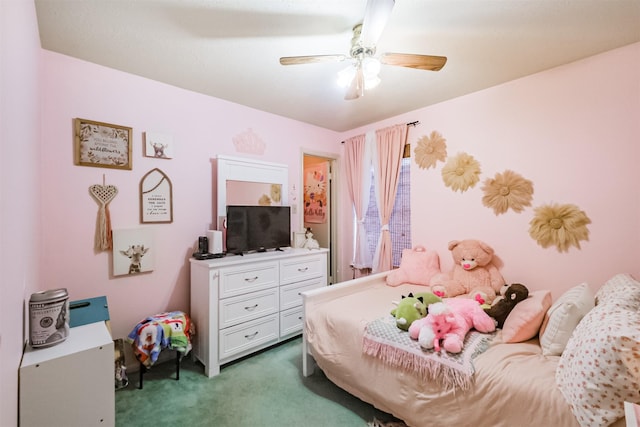 bedroom featuring ceiling fan and carpet floors